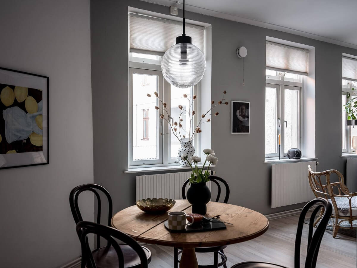 A Cozy Monochrome Gray Studio Apartment 11 small round wooden dining table studio apartment nordroom