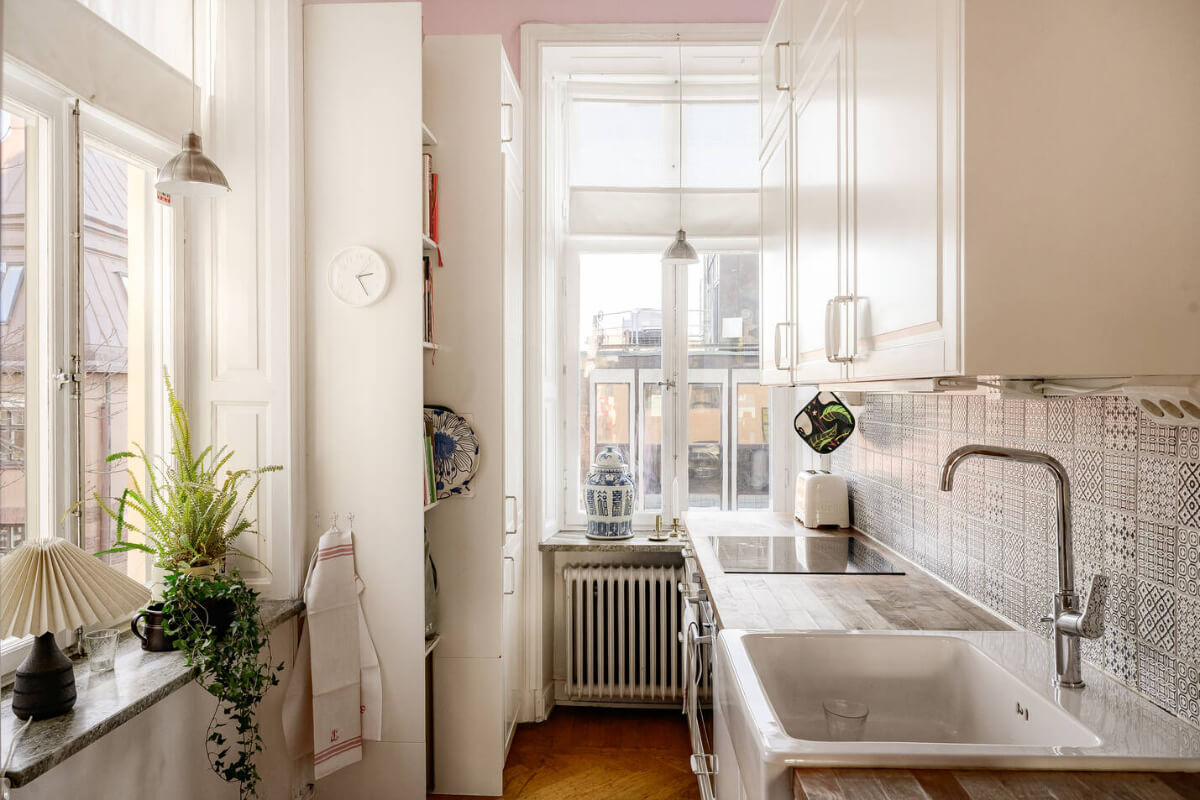 A Pink Living Room in a Light-Filled Stockholm Apartment 7 small white kitchen pink walls