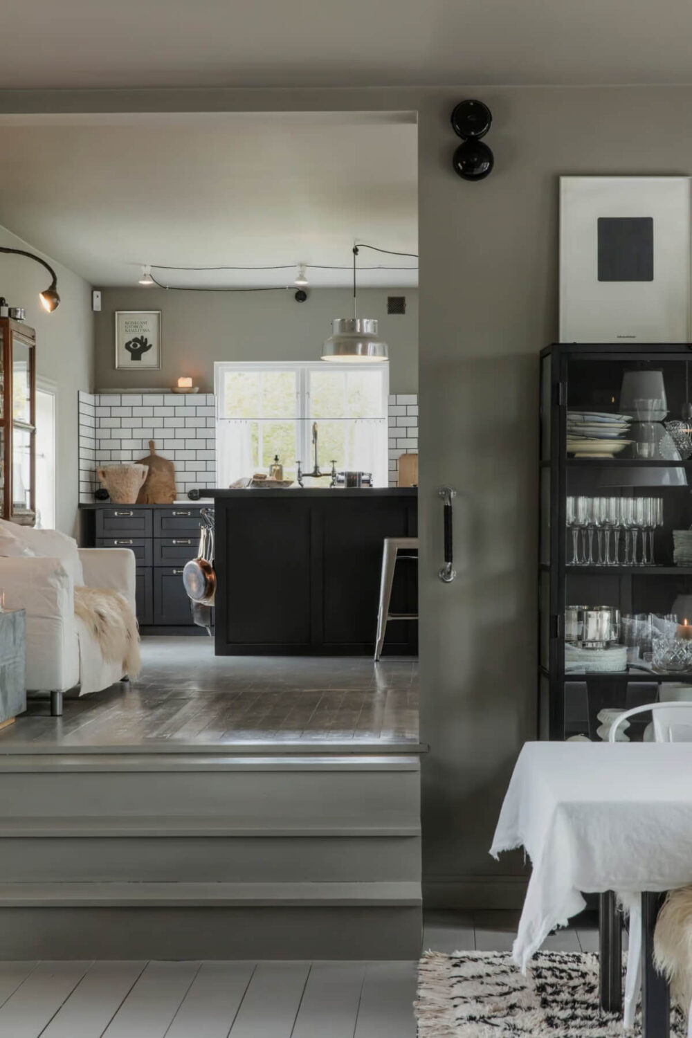 An Open-Plan Gray Home in a Former Textile Factory 5 split level gray living space