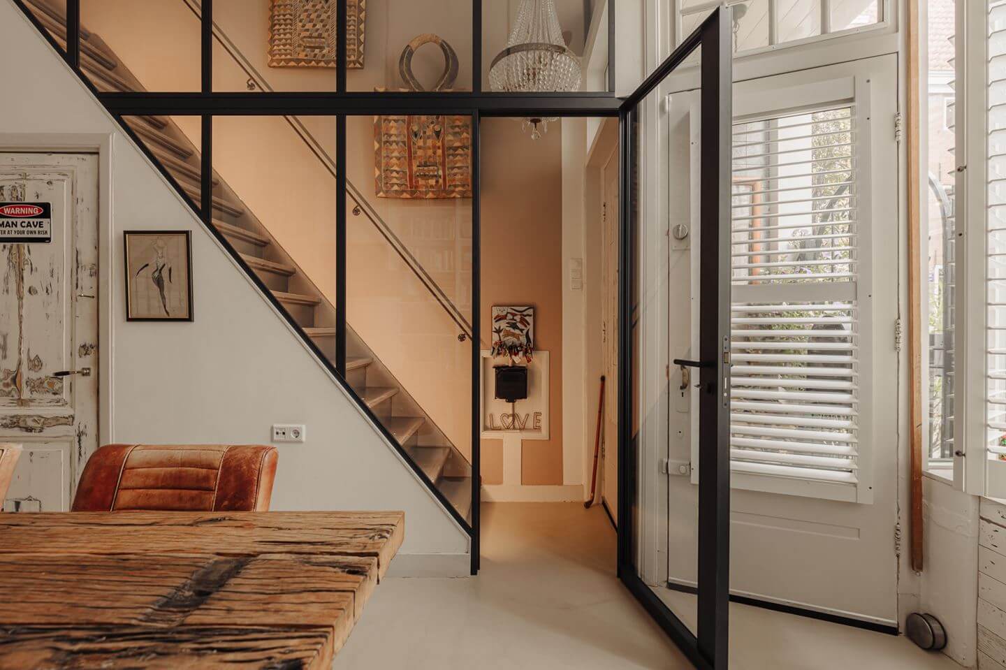 A Charming Amsterdam Townhouse with a Cozy Roof Terrace 4 steel glass wall