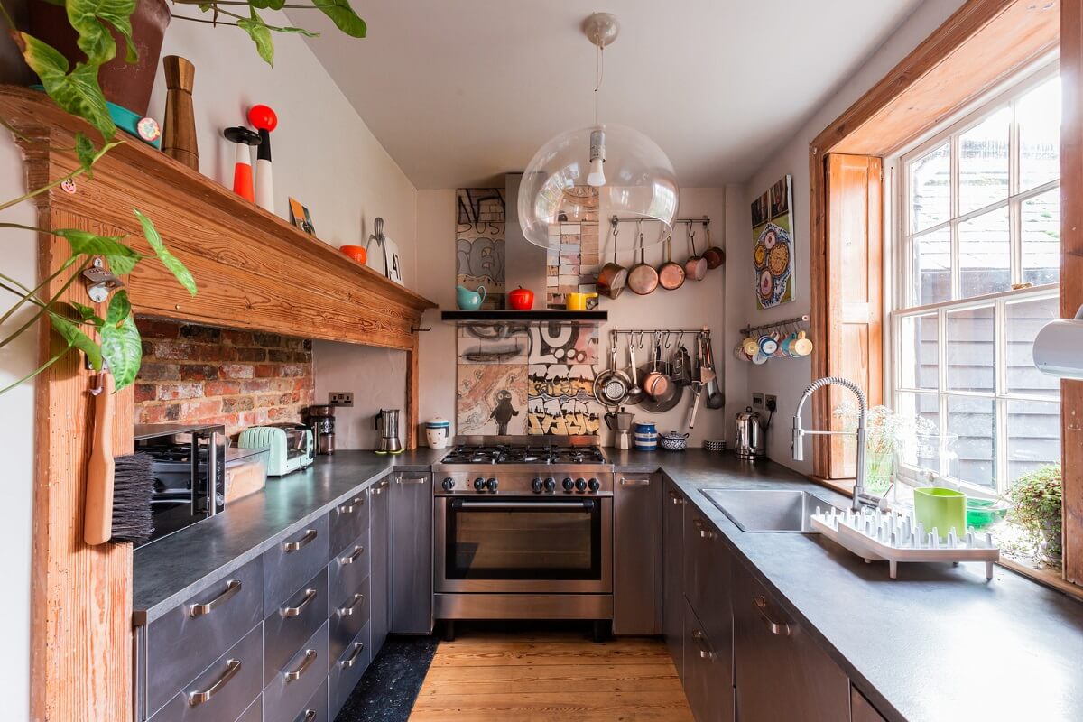 Rustic Wooden Elements in a Historic English House 2 steel kitchen exposed wooden beam