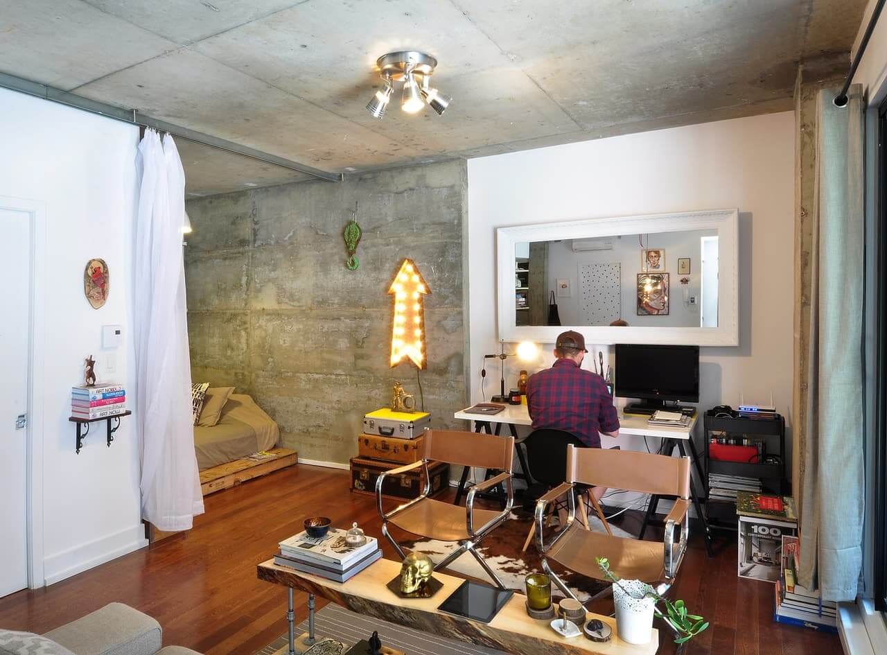 52 Studio Apartments with a Curtain Room Divider 46 studio-apartment-concrete-walls-curtain-room-divider-nordroom