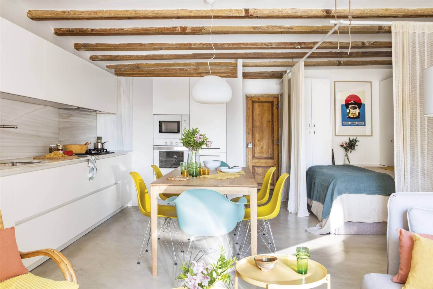 52 Studio Apartments with a Curtain Room Divider 2 studio-apartment-white-kitchen-wooden-beams-curtain-room-divider-nordroom