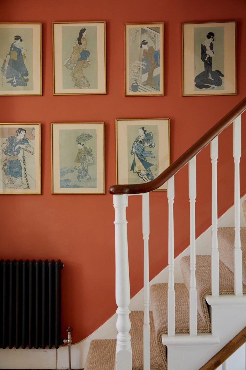A Light-Filled Maisonette Home in London 9 terracotta-wall-color-gallery-wall-staircase-nordroom
