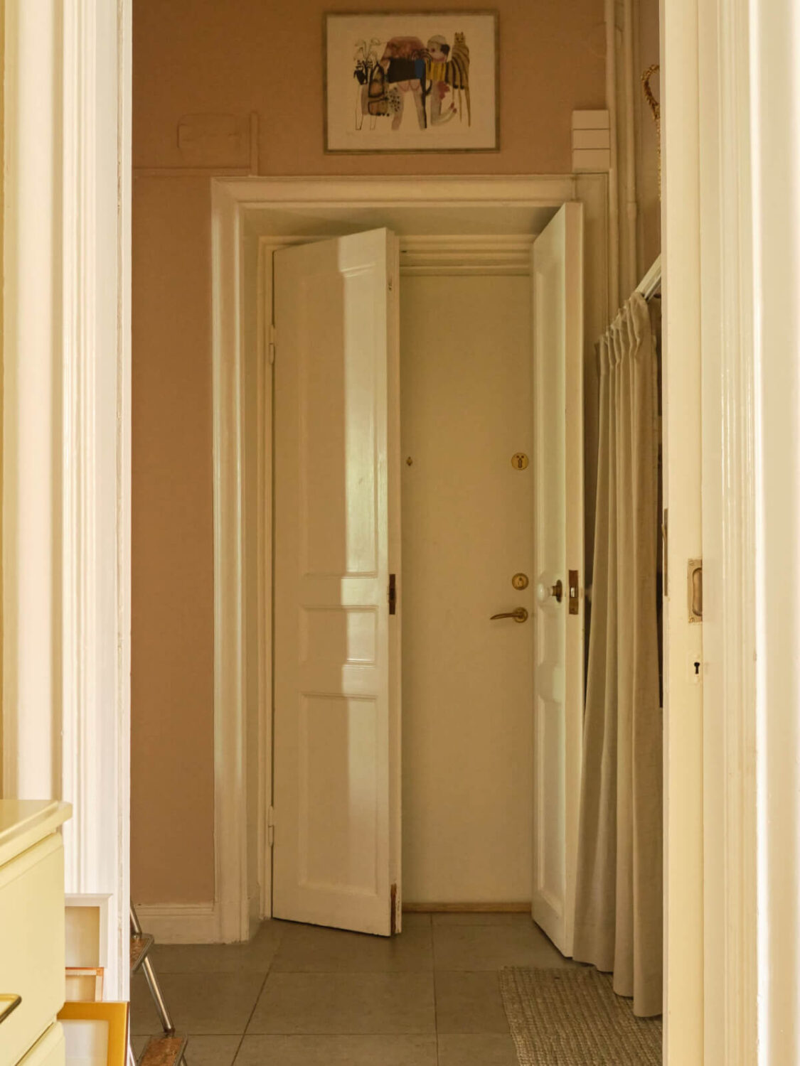 A Beautiful Color Palette and Historic Elements in a Stockholm Apartment 30 tiled hall A Beautiful Color Palette and Historic Elements in a Stockholm Apartment