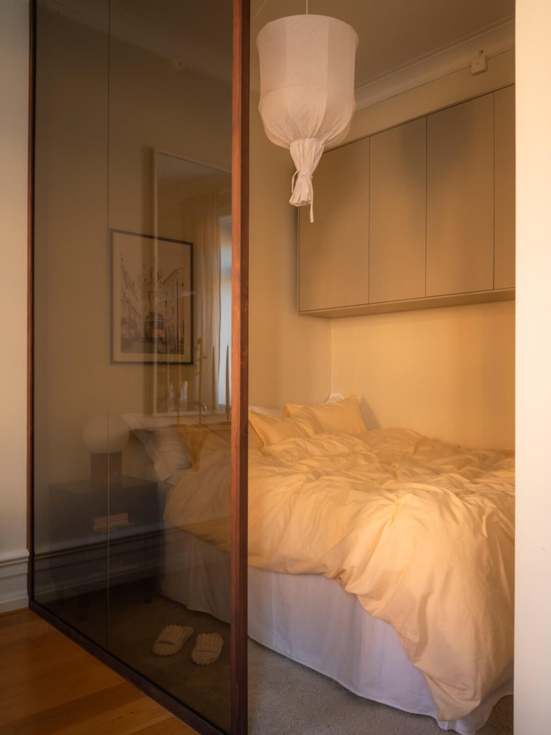 A 19th Century Apartment with a Dark Glass Room Divider 6 tiny bedroom