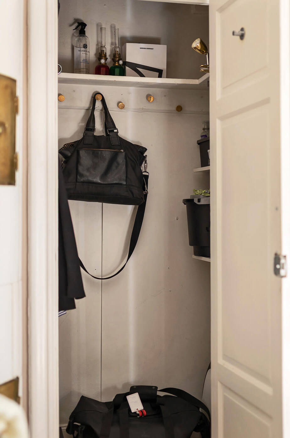 A Charming Studio Apartment with Leafy Courtyard Views 13 tiny built-in wardrobe