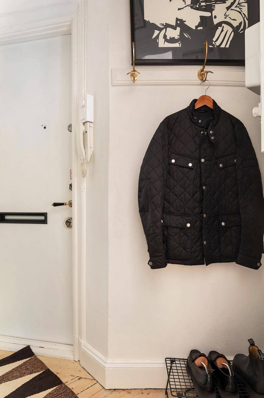 A Charming Studio Apartment with Leafy Courtyard Views 14 tiny hallway with storage