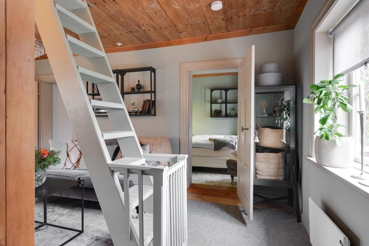 tiny living room stairs woodenceiling