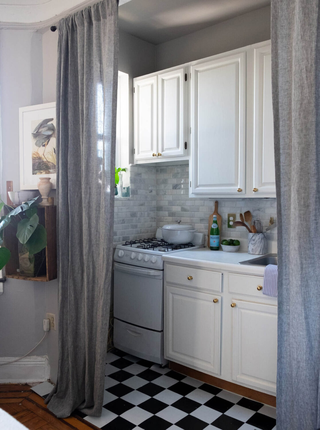 52 Studio Apartments with a Curtain Room Divider 38 tiny-studio-gray-curtain-hides-kitchen-nordroom
