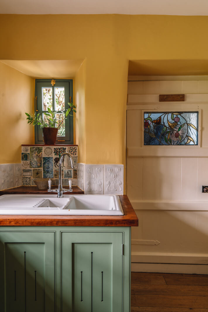 A Colorful 19th-Century Cottage in the Lake District 5 tiny window above kitchen sink