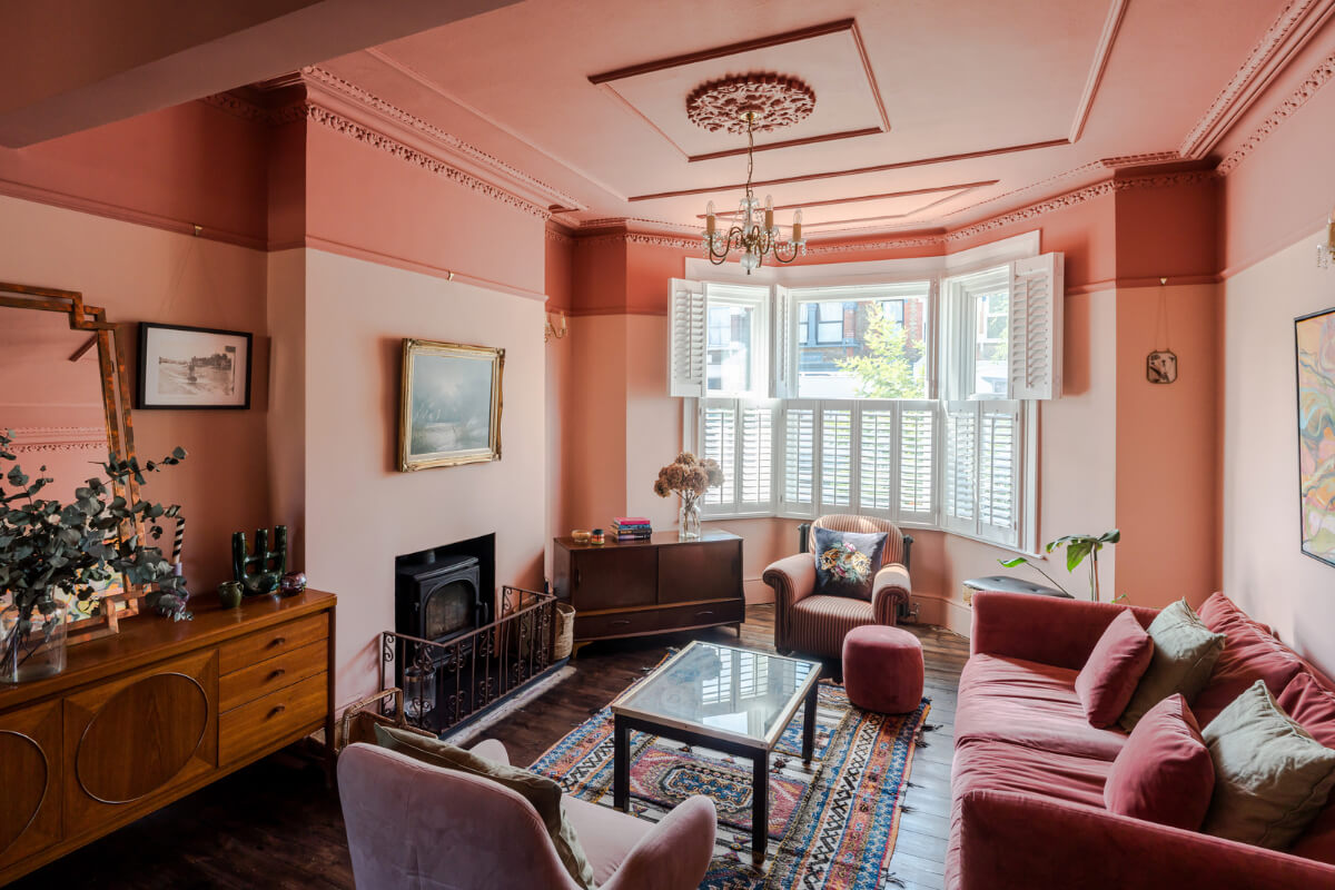 two-tone pink living room fireplace