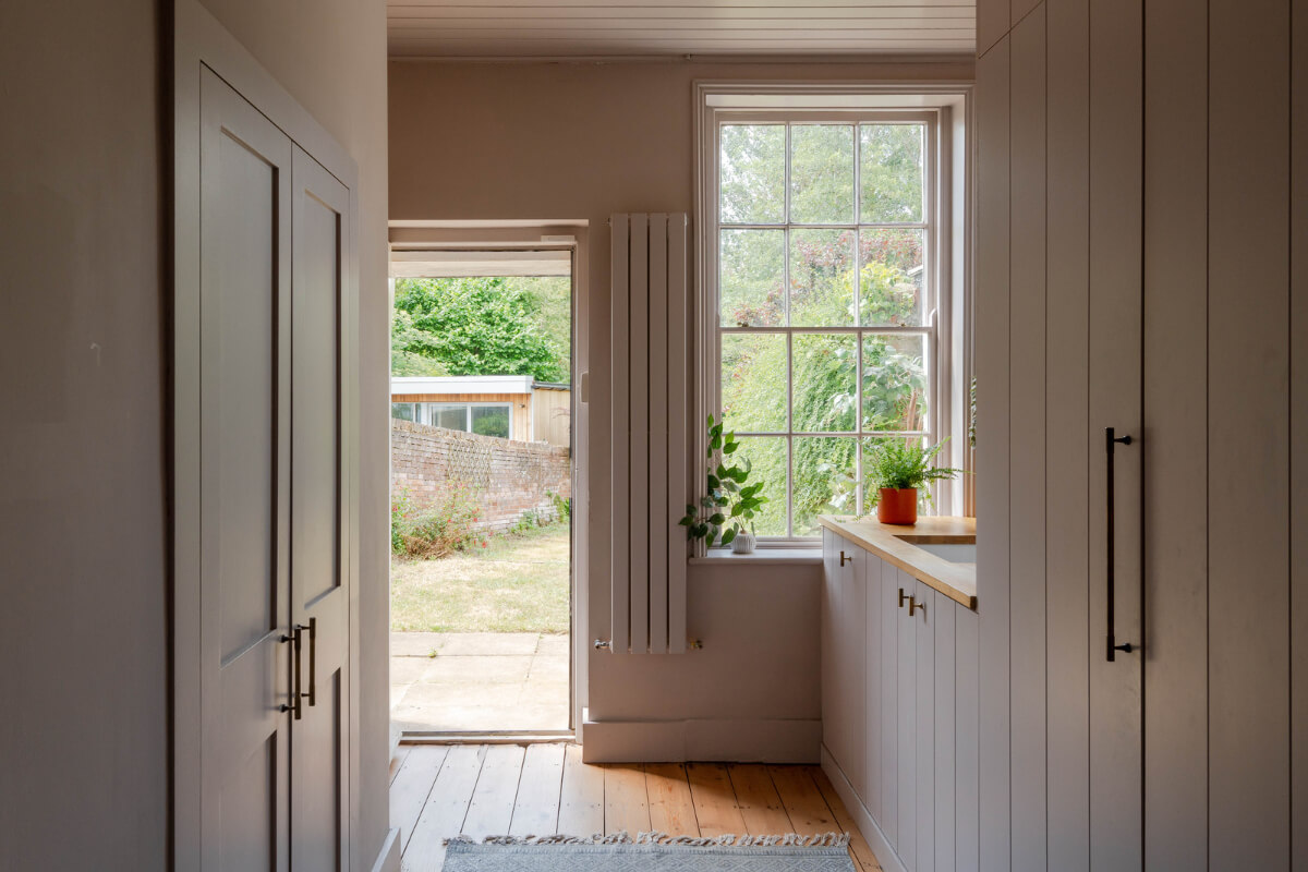 Vibrant Colors in a 19th-Century Regency Townhouse in England 6 utility room built-in cabinets