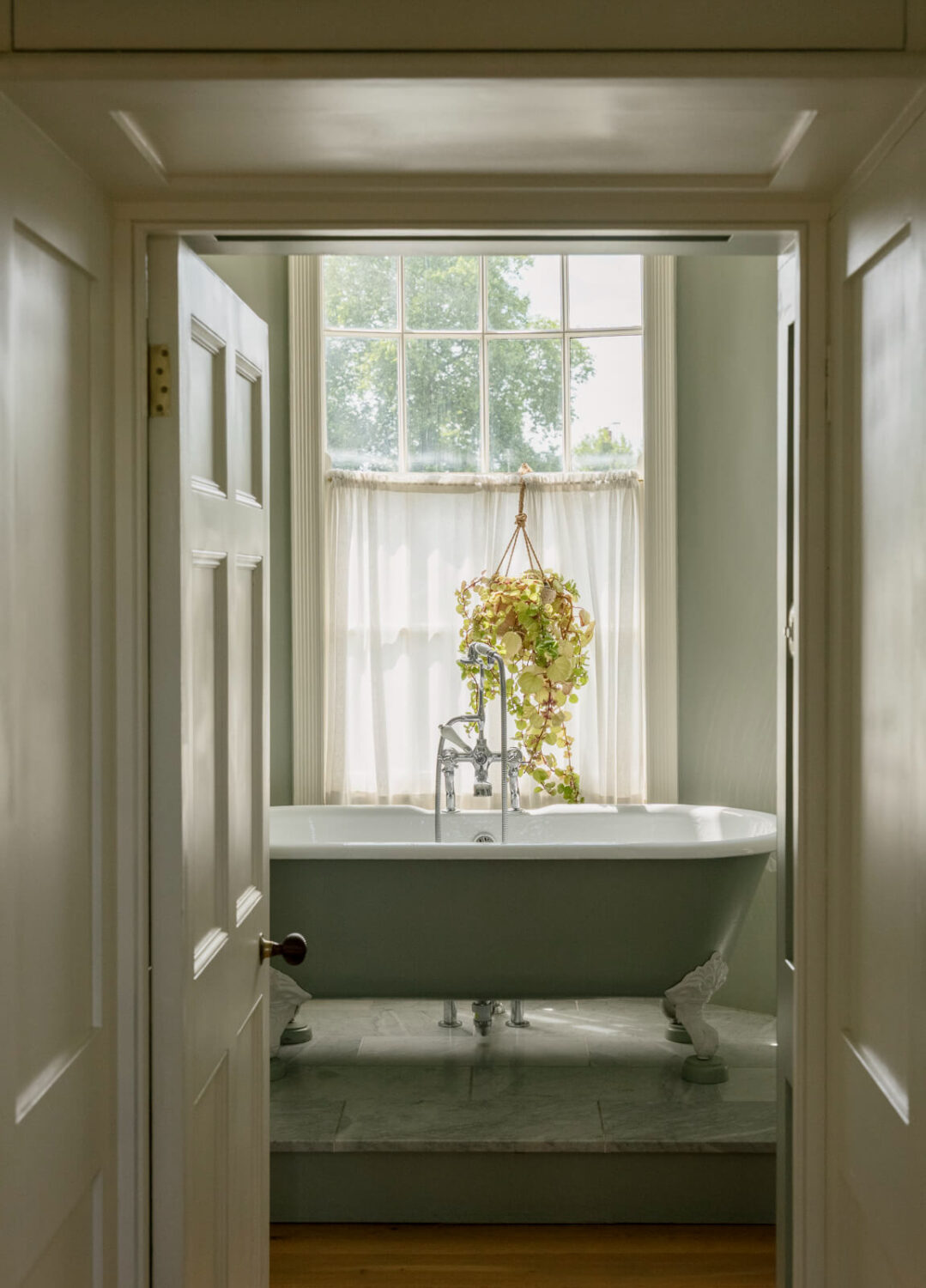 A Classic Georgian House in London with a Lush Garden 24 view-into-bathroom-freestanding-bath.jpg