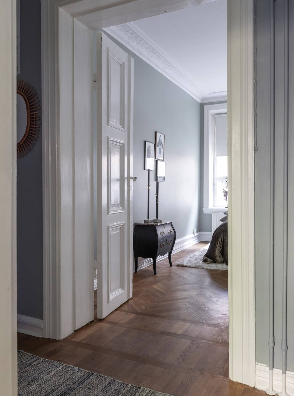 Classic Proportions and a Charming Kitchen in a Malmö Apartment 9 view into bedroom