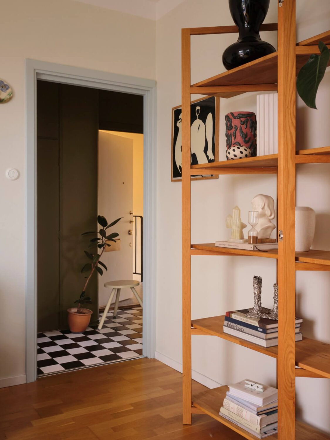 A 1940s Swedish Apartment with a Soft Yellow Kitchen 8 view into hall