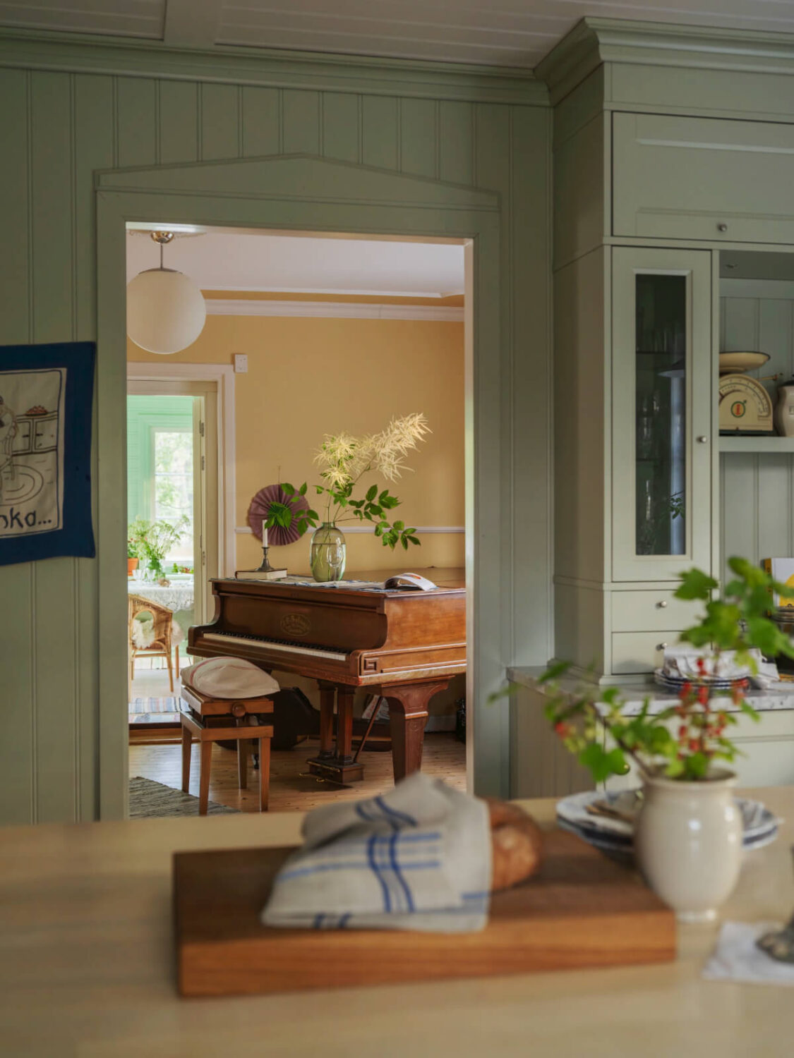 A 1930s Lakeside Country House with a Private Beach 16 view-into-music-room