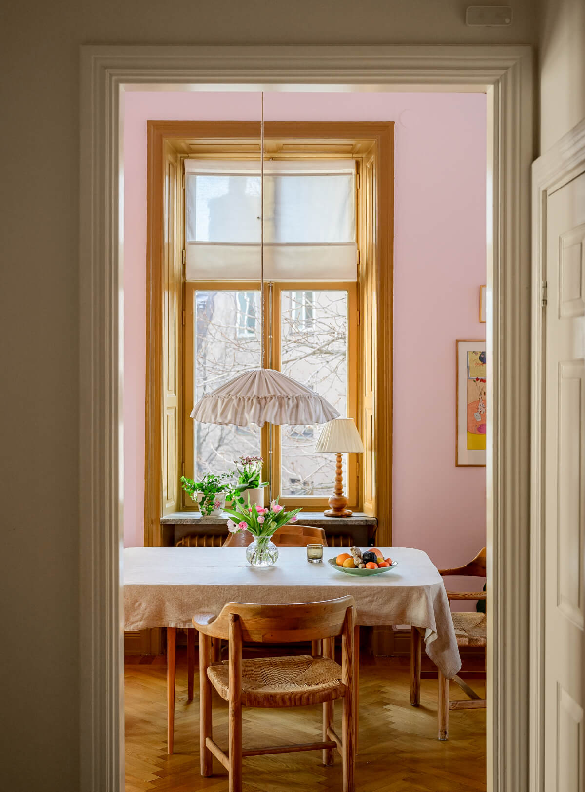 view into pink dining room