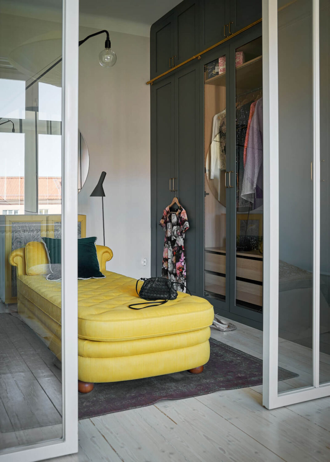 Behr Color of the Year 2026: Hidden Gem 19 walk in closet blue green wardrobe doors yellow sofa nordroom Behr Color of the Year 2026: Hidden Gem