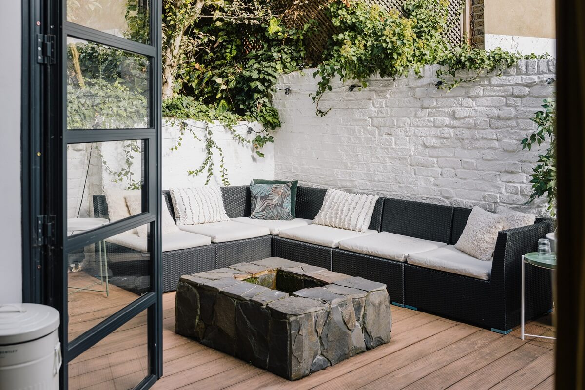 A Charming One-Bedroom Apartment with a Courtyard Terrace 13 walled city garden with corner bench A Charming One-Bedroom Apartment with a Courtyard Terrace