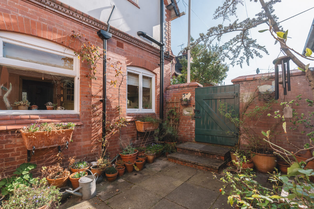 A Sage Green Kitchen in a Charming Arts and Crafts House 18 walled garden arts and crafts house