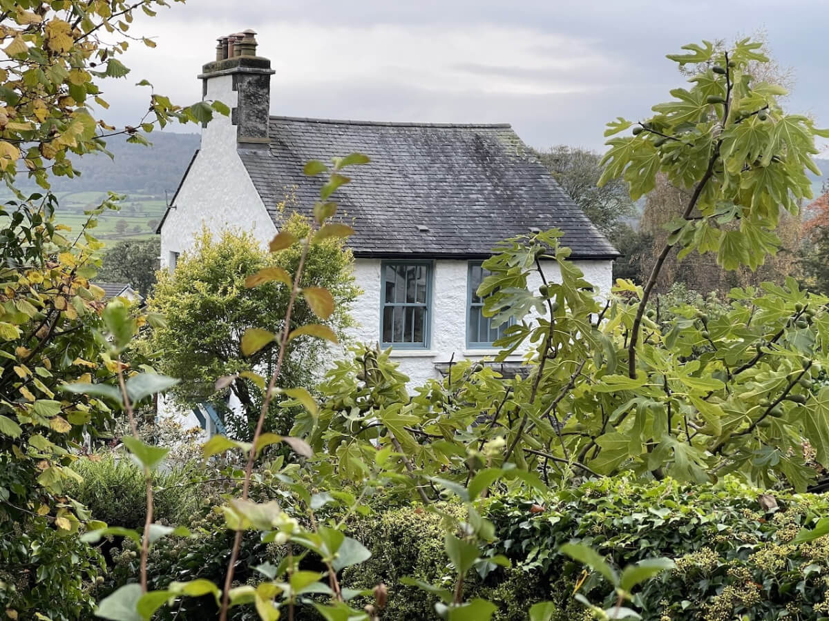 A Colorful 19th-Century Cottage in the Lake District 20 white english cottage blue window frames