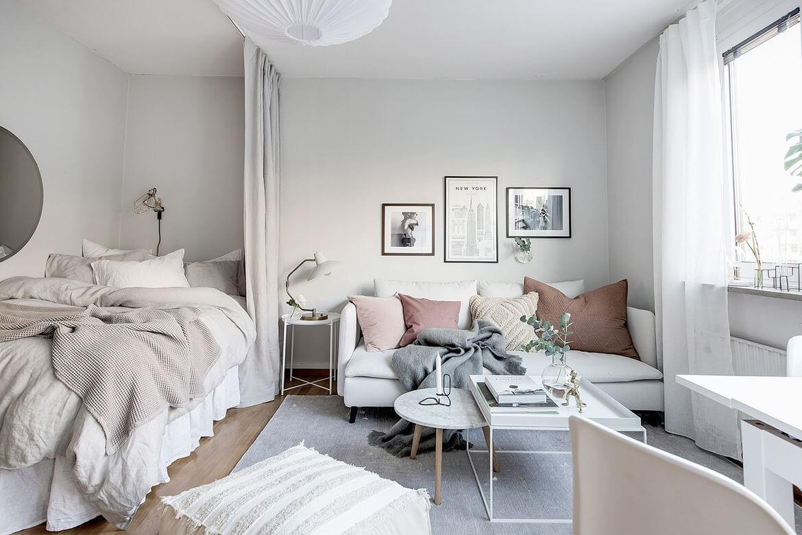 52 Studio Apartments with a Curtain Room Divider 58 white-gray-scandi-studio-apartment-layered-textiles-curtain-room-divider-nordroom
