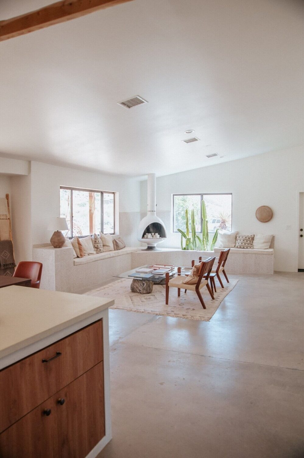 A Colorful Airbnb Home in the Morongo Valley 7 white-kitchen-living-space-nordroom