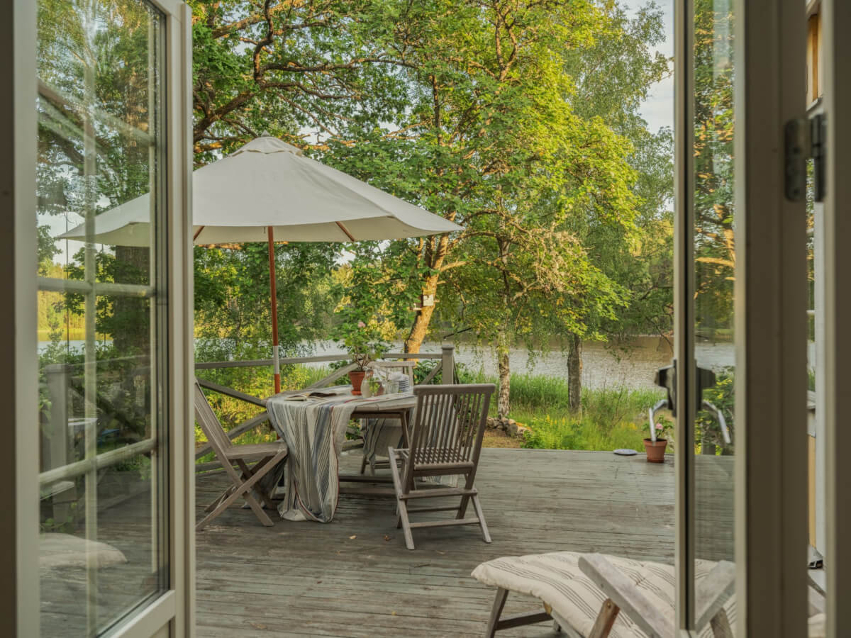 A 1930s Lakeside Country House with a Private Beach 22 wooden terrace