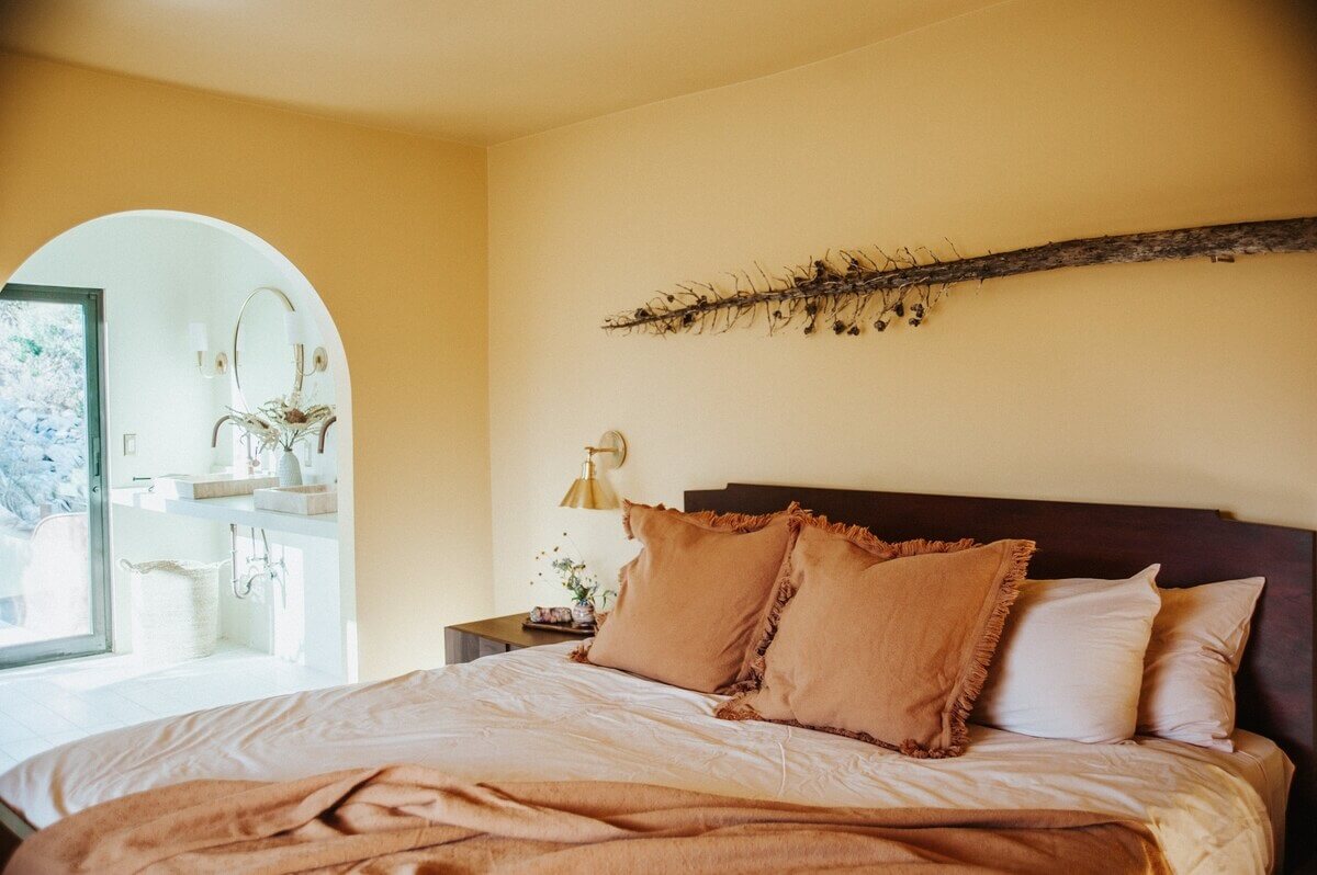 A Colorful Airbnb Home in the Morongo Valley 20 yellow-bedroom-arched-doorway-nordroom