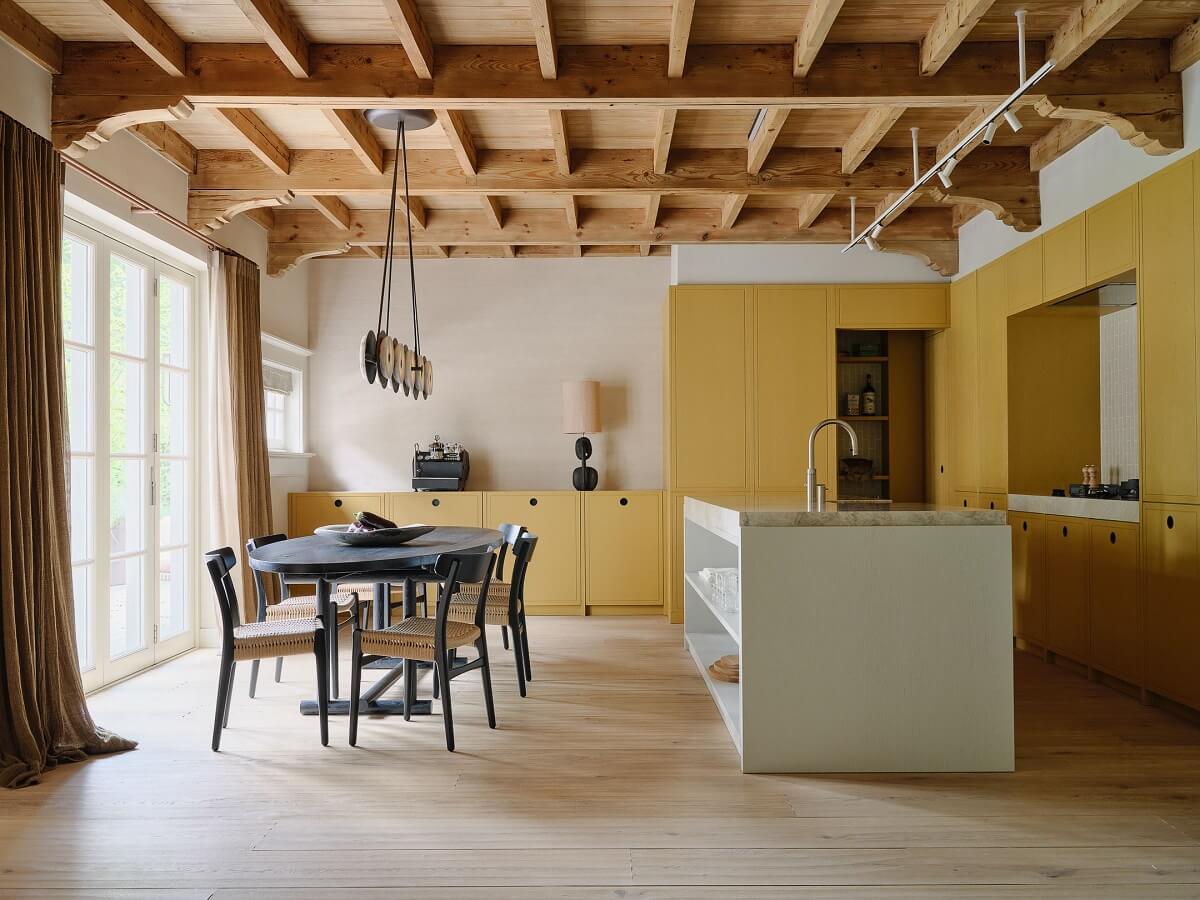 Yellow Kitchen Design Ideas (with Paint Colors) 5 yellow kitchen cabinets and exposed wooden ceiling nordroom