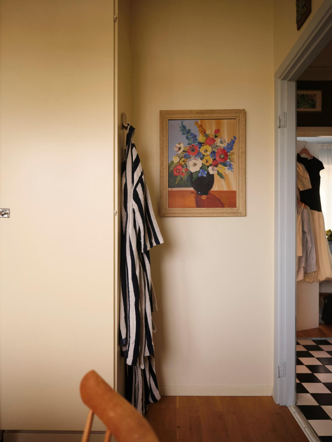 A 1940s Swedish Apartment with a Soft Yellow Kitchen 13 yellow kitchen floral painting