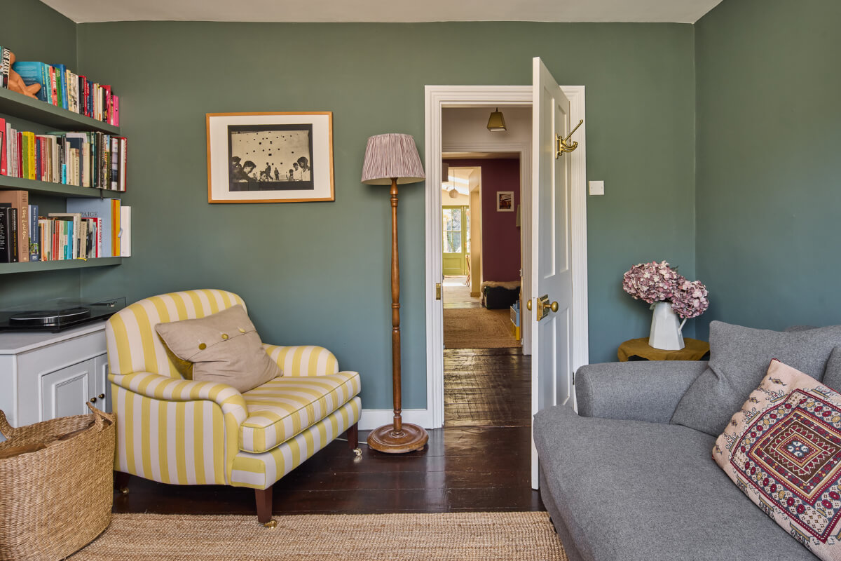 A 19th Century London Cottage with a Stunning Kitchen Extension 3 yellow striped armchair
