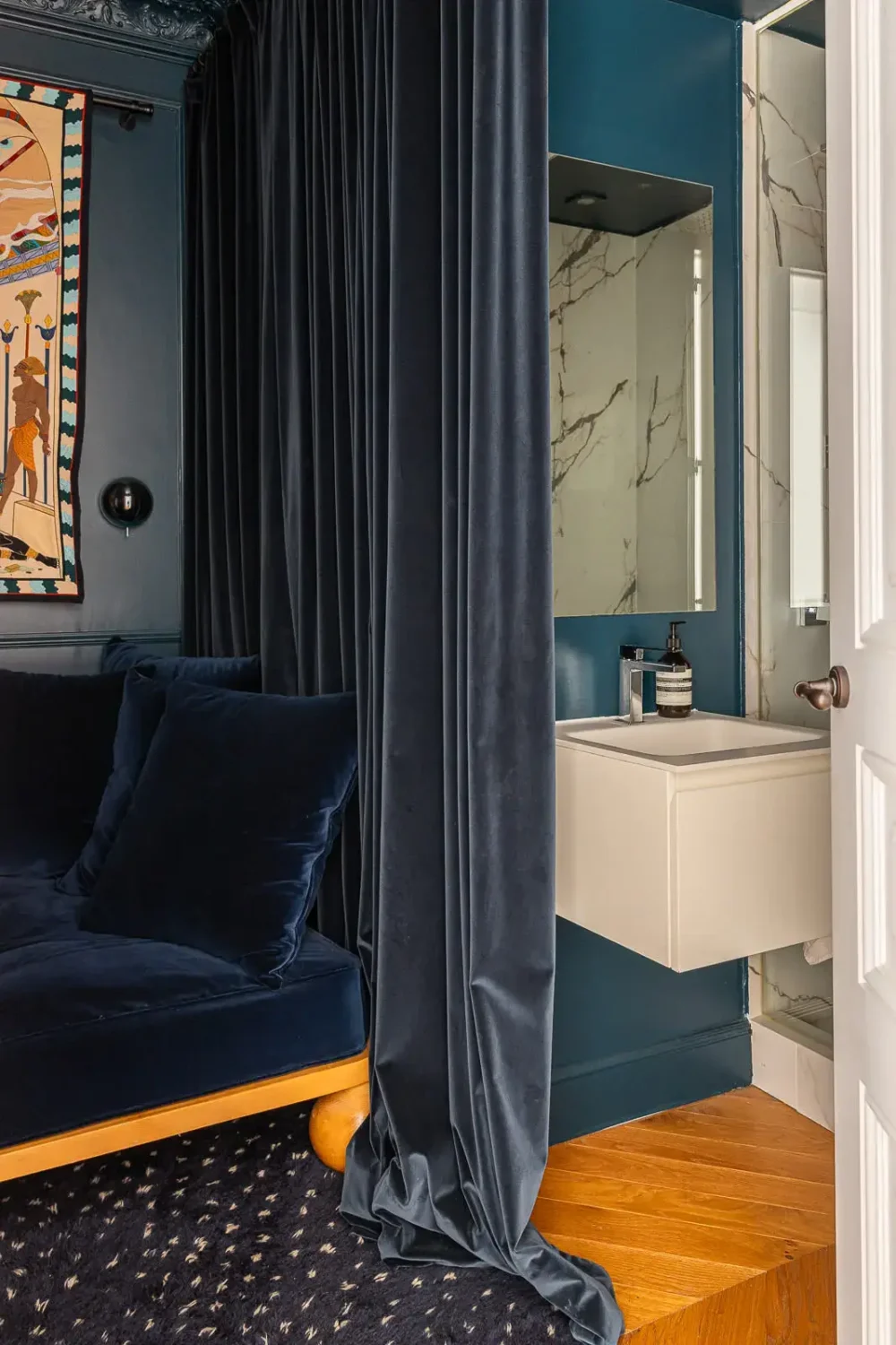 Contemporary Design in a Renovated Barcelona Apartment 12 dark blue bathroom velvet curtain