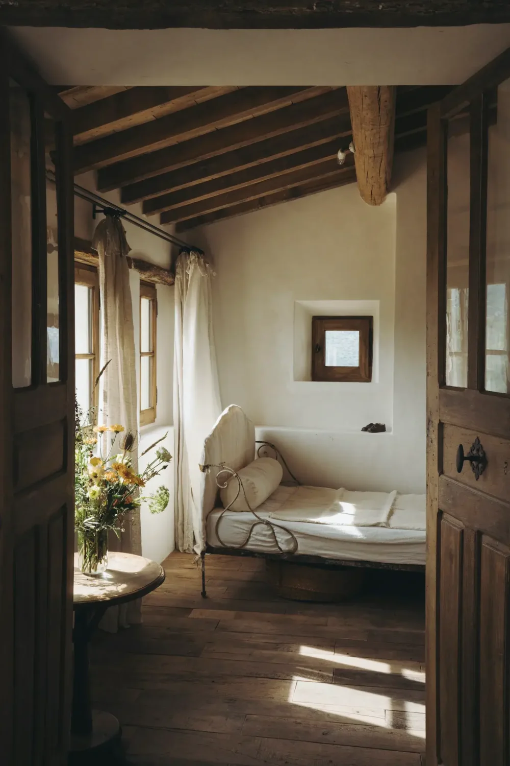 Provencal Maison Aumône is the Perfect French Country House 1 daybed-wooden-ceiling-beams-french-country-style-provence-airbnb-nordroom