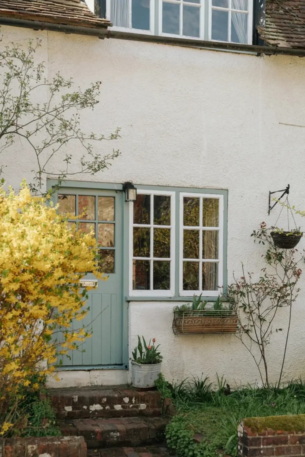 A Historic English Cottage Decorated in Pink & Blue Tones 21 duck egg-blue front door historic english cottage