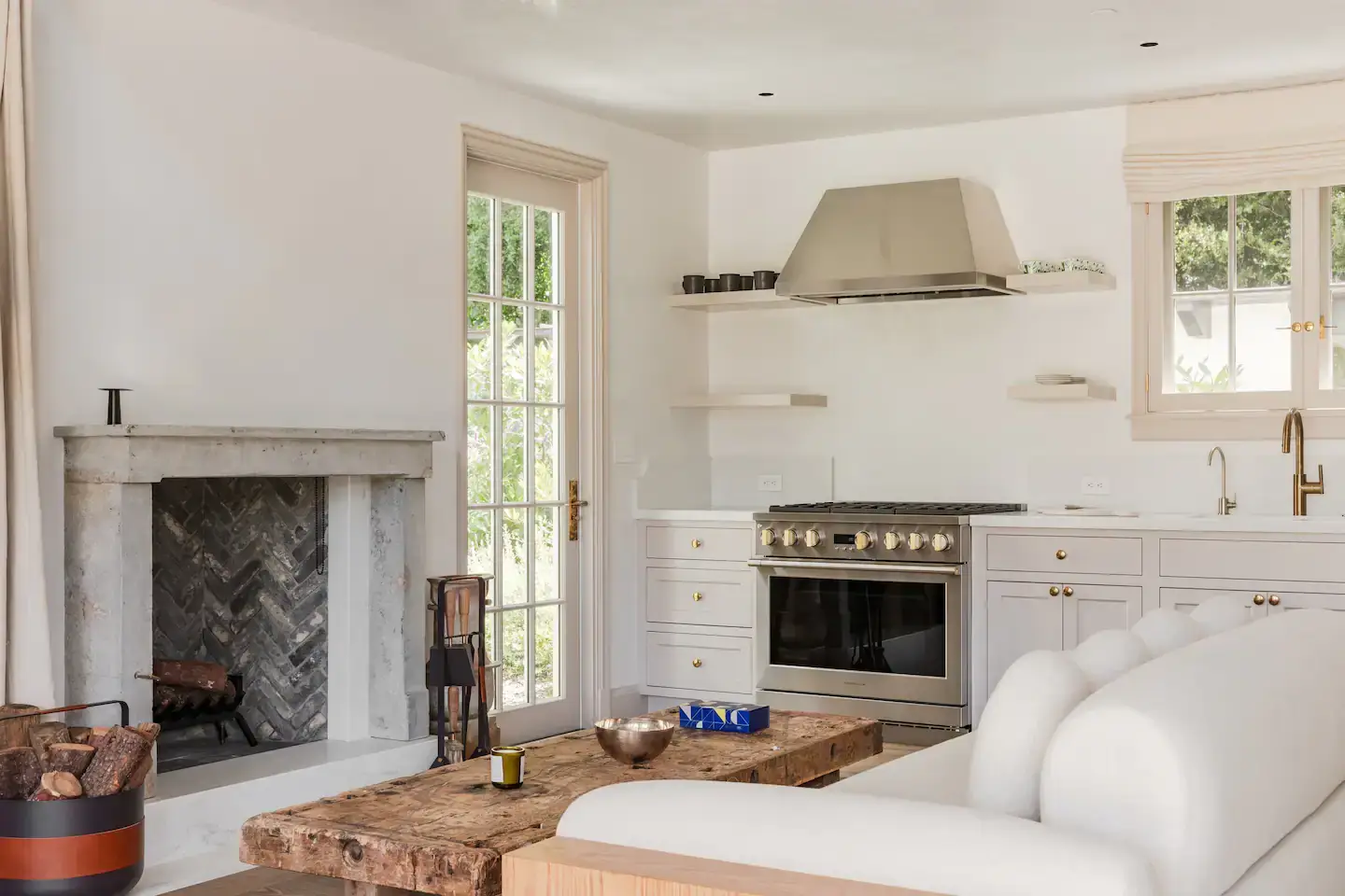Gwyneth Paltrow's Serene Guesthouse in Montecito 3 fireplace-living-room-kitchen-gwyneth-paltrow-guesthouse-nordroom