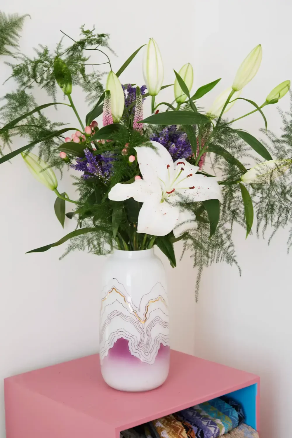 You Can Stay in This Colorful Design Apartment in Copenhagen 20 flowers on pink table