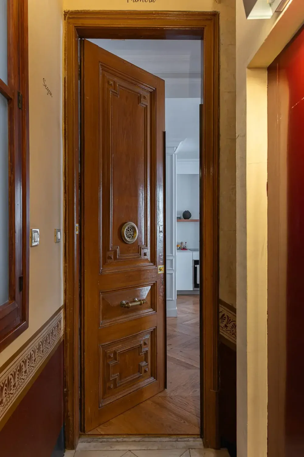Contemporary Design in a Renovated Barcelona Apartment 15 front door Contemporary Design in a Renovated Barcelona Apartment