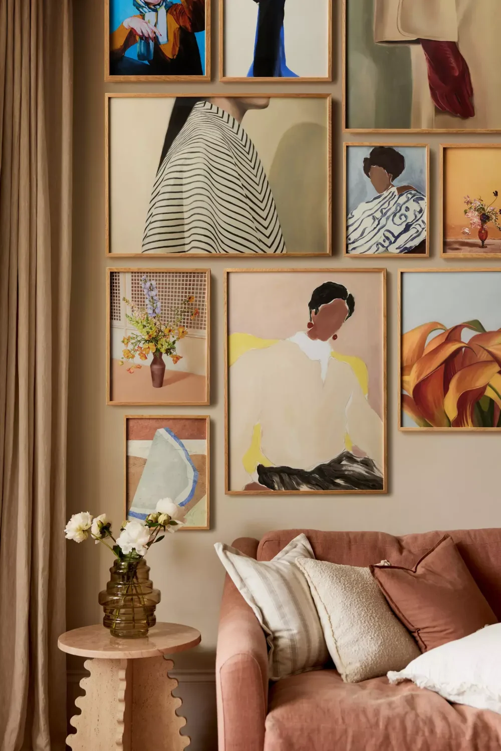 Pantone Color of the Year 2025: Mocha Mousse Interior Inspiration 23 gallery wall and brown couch pantone color of the year Pantone Color of the Year 2025: Mocha Mousse Interior Inspiration