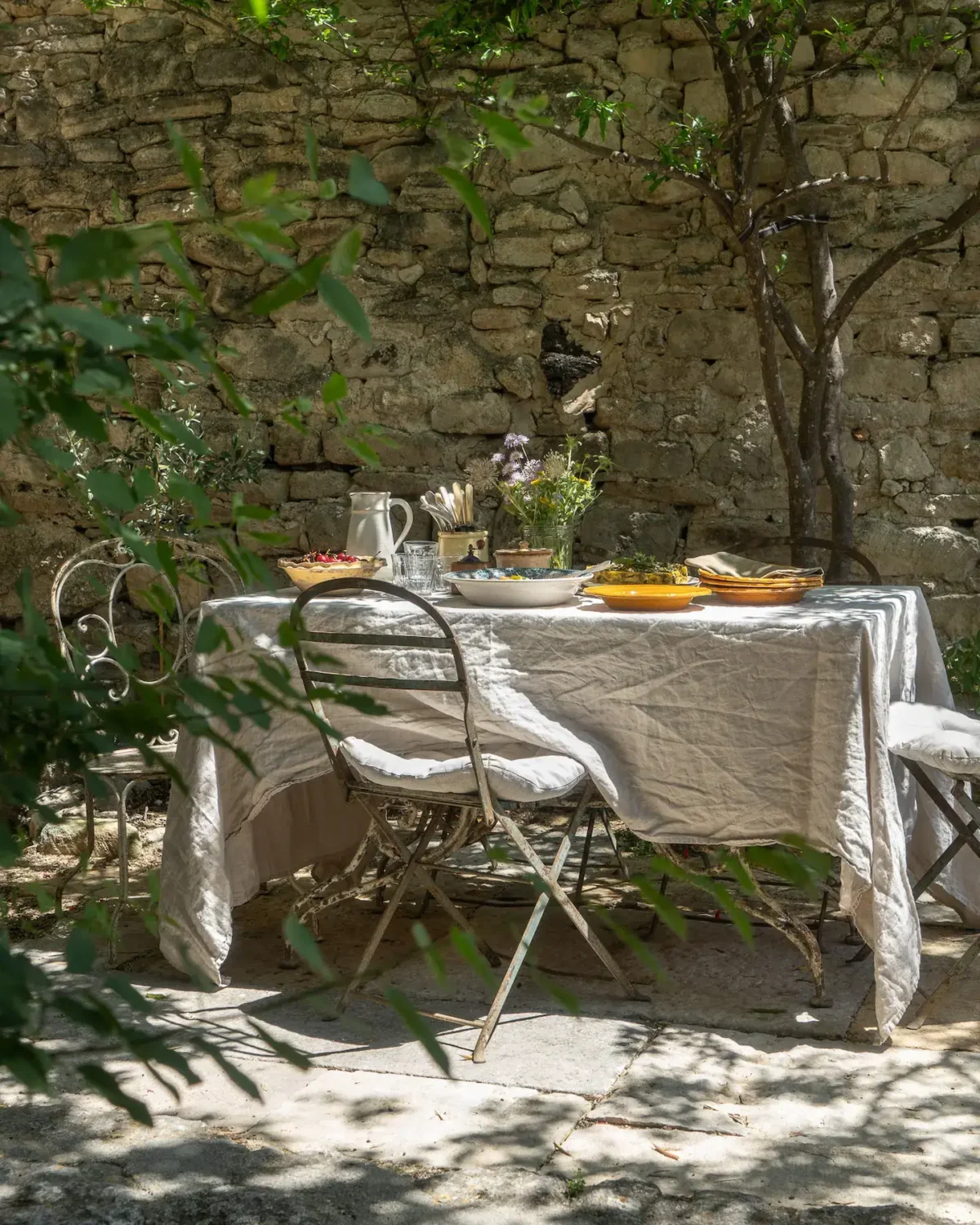 Provencal Maison Aumône is the Perfect French Country House 15 garden-dining-table-french-country-house-airbnb-nordroom