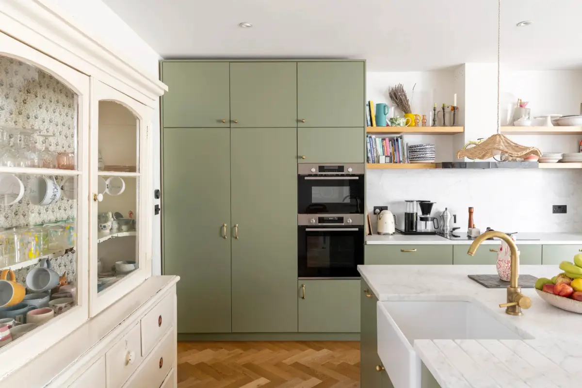 A Beautiful Extended Victorian House in Queen's Park 8 green kitchen brass fittings herrinbone floor