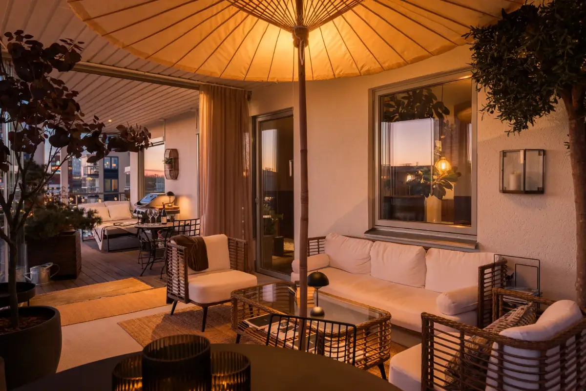 large terrace evening A Top Floor Swedish Apartment with a Huge Balcony