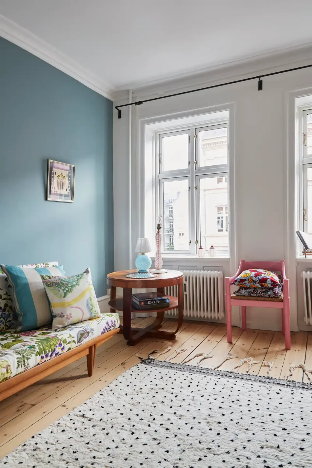 You Can Stay in This Colorful Design Apartment in Copenhagen 4 living room with blue wall
