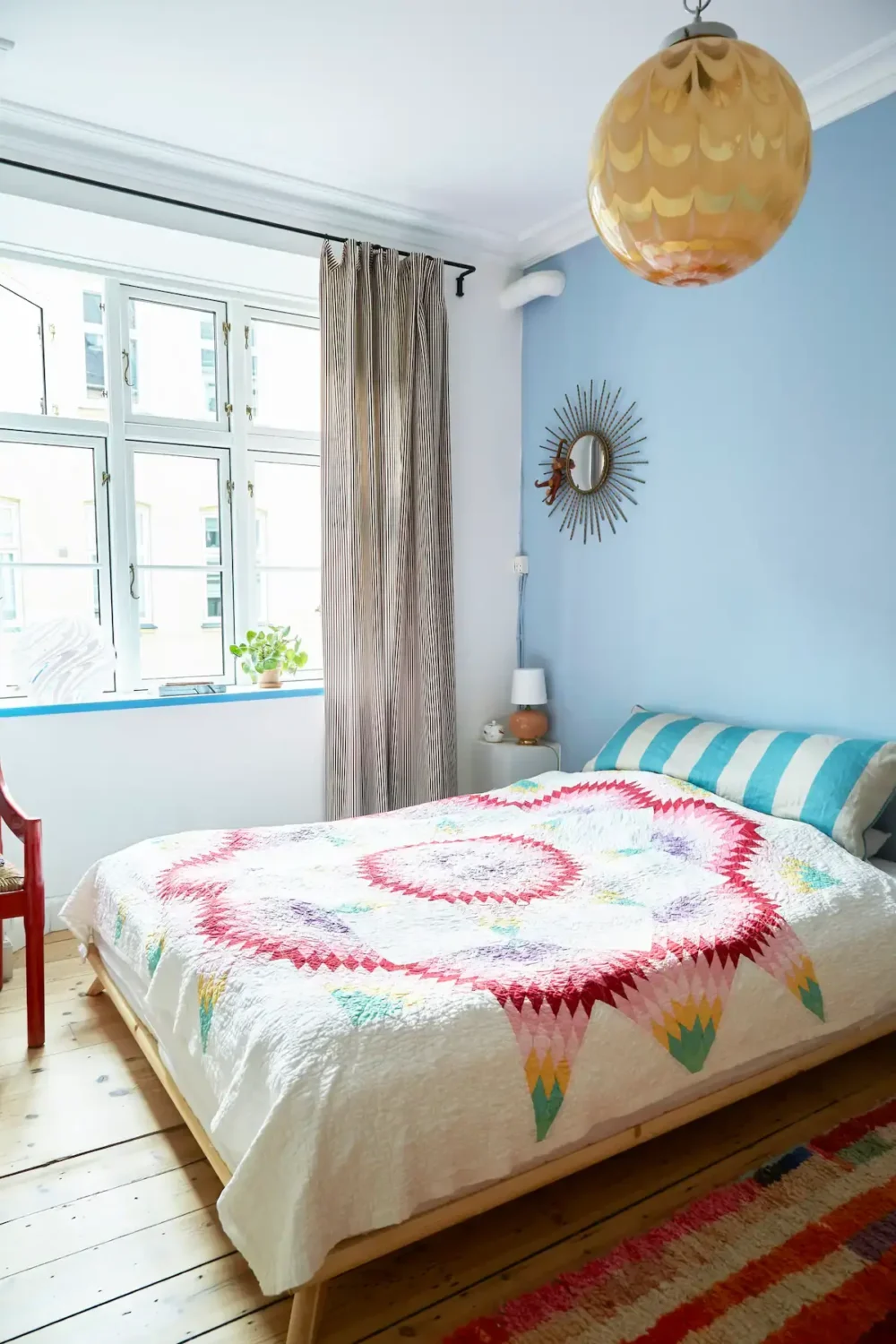 You Can Stay in This Colorful Design Apartment in Copenhagen 16 master bedroom with light blue wall