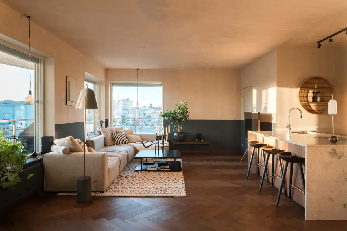 open plan living room two tone wall herringbone floor