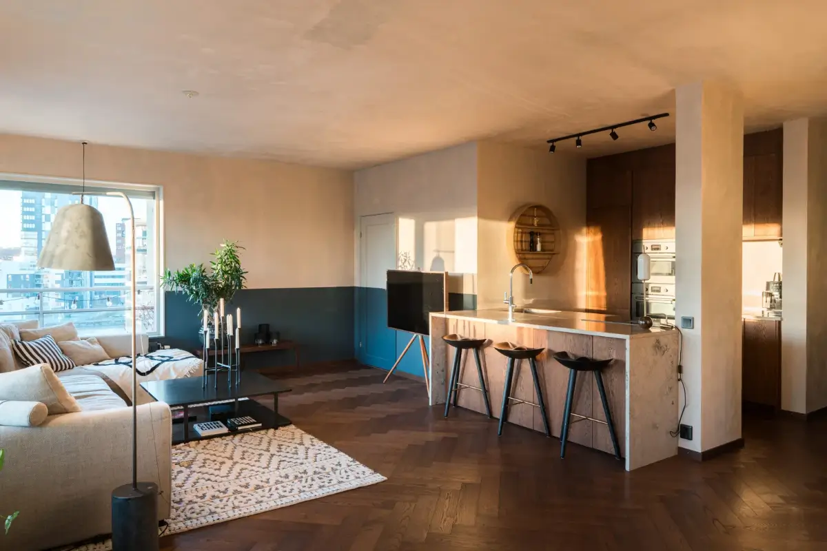 open plan living space dark herringbone floor