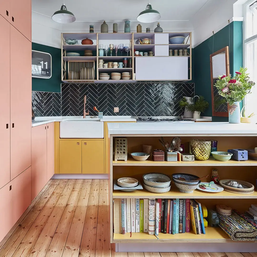 Yellow Kitchen Design Ideas (with Paint Colors) 36 pluck-kitchen-two-tone-cabinets-yellow-pink-wooden-floor-nordroom