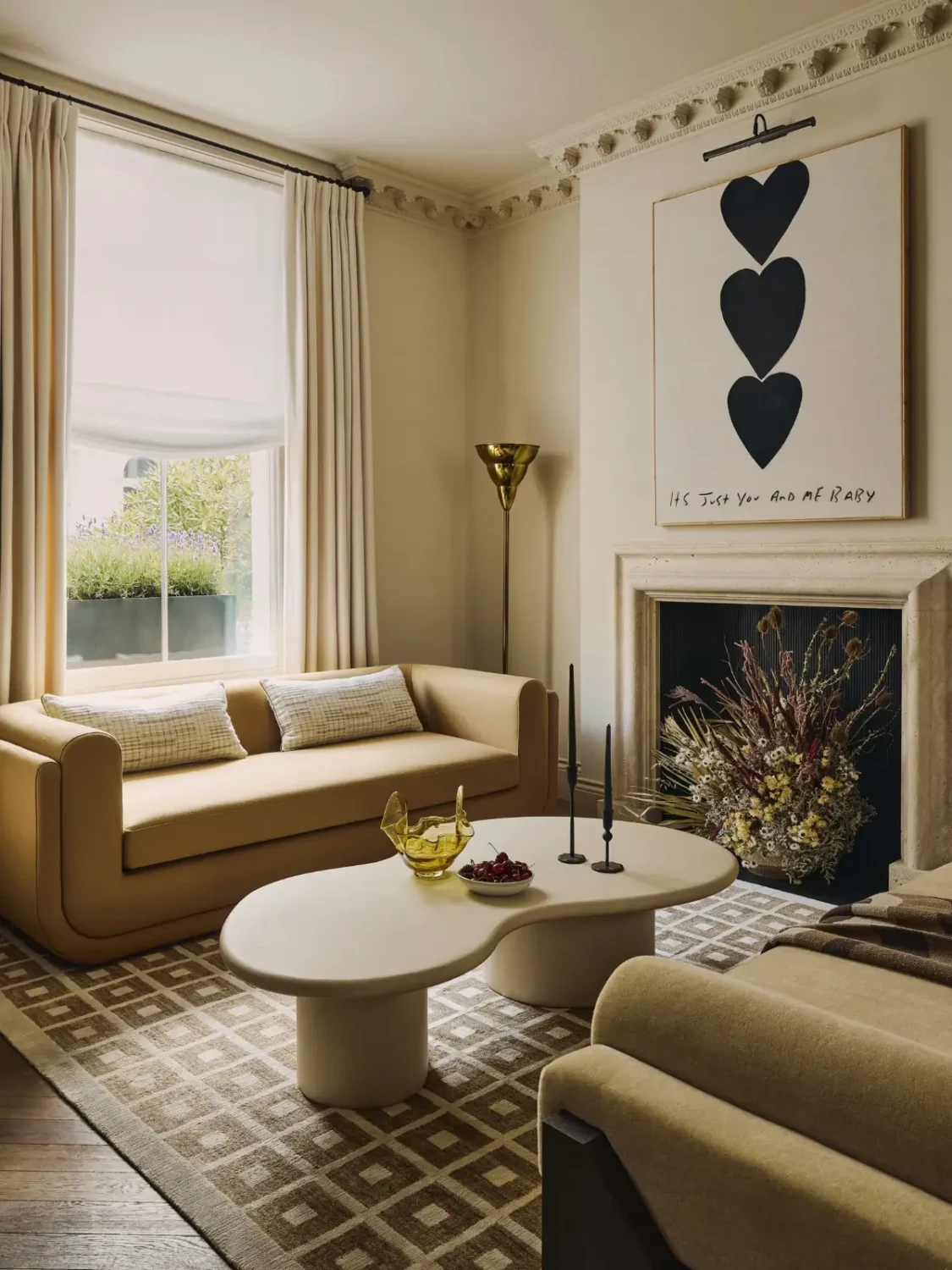 Luxurious Interiors in a Victorian Townhouse in Chelsea 13 sitting room fireplace curved coffee table