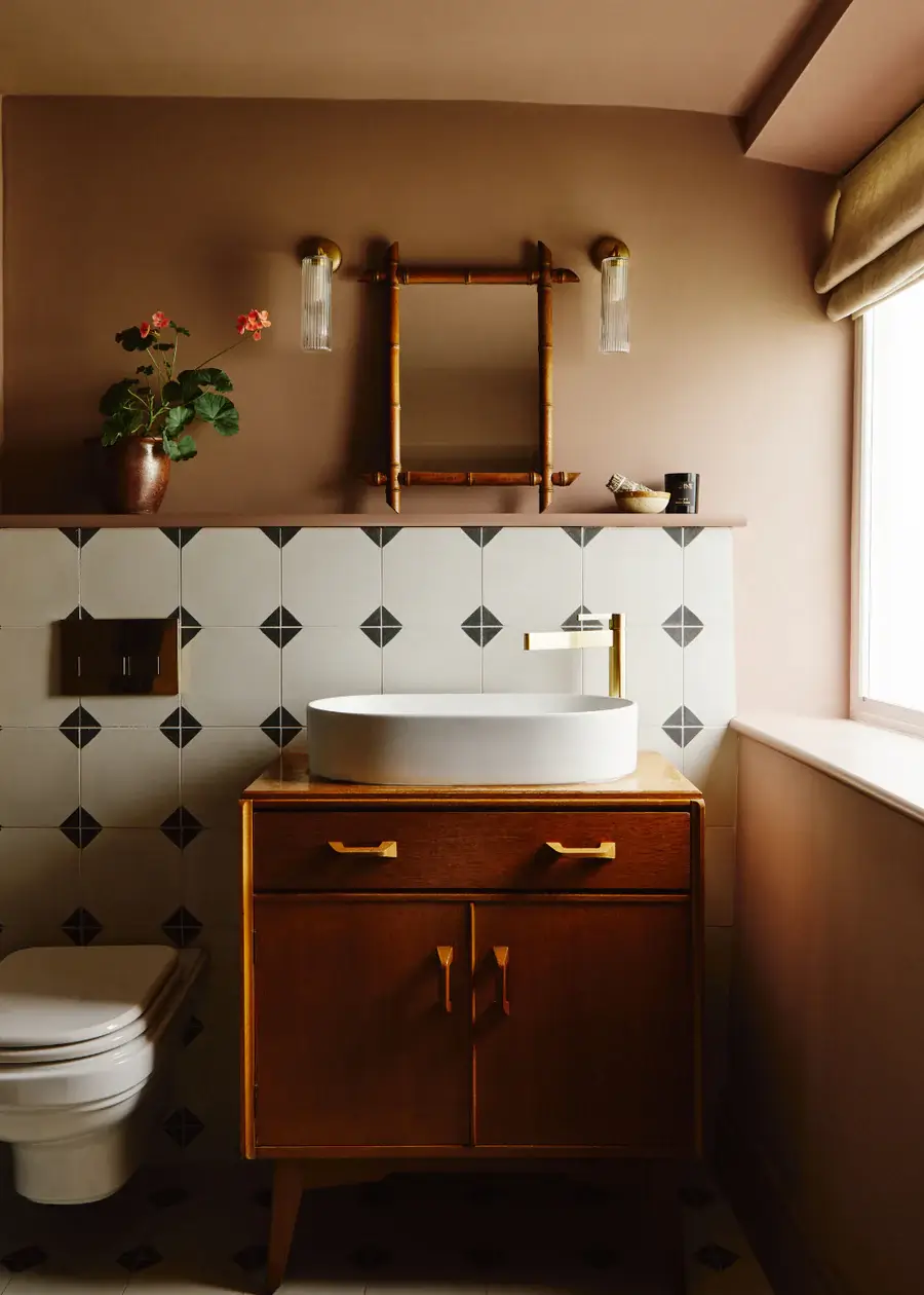 Pantone Color of the Year 2025: Mocha Mousse Interior Inspiration 22 small brown bathroom with black and white tiles nordroom Pantone Color of the Year 2025: Mocha Mousse Interior Inspiration